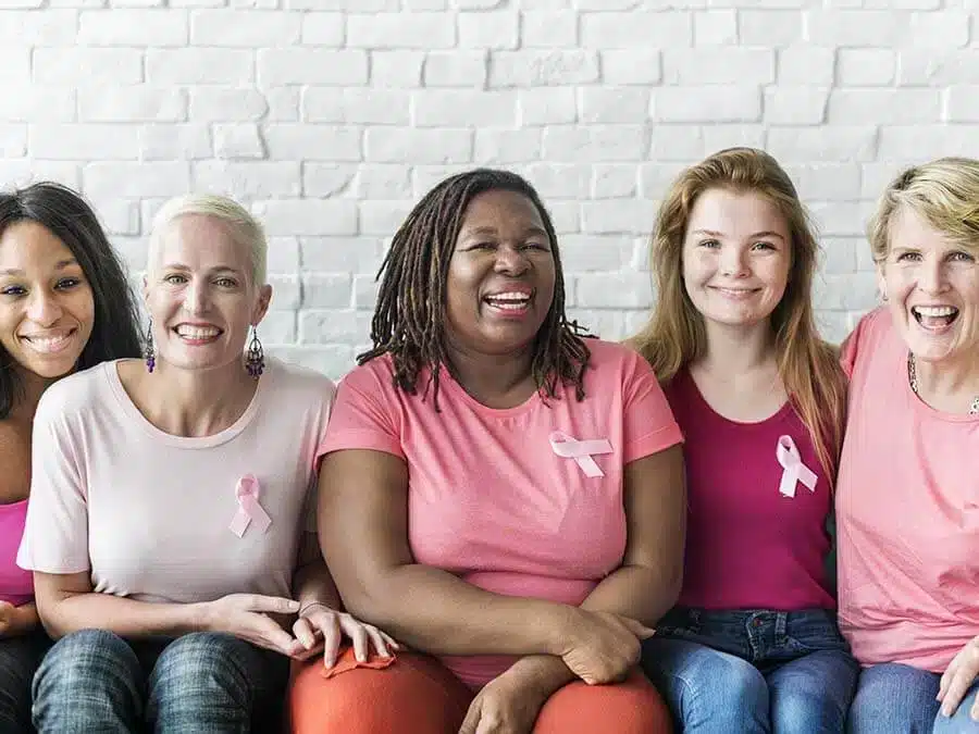 group of women showing support to cancer awareness